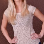 Tall blond solo model Tery posing non nude in denim jeans before undressing