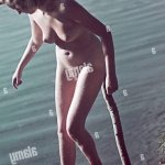 people nude naked woman at a lake Germany 1940s 40s eroticism Stock Photo