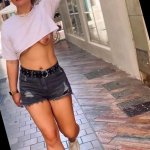 Walking the city Braless in an Underboob top.