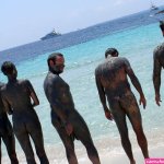 File:Muddy naked people at the beach at Formentera.jpg