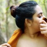 Ravishing Desi MILF opens her brown shirt and shows topless big boobs and large nipples in outdoor