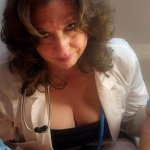A Sexy Mature MILF Doctor Examines A Young Man And His Curved Cock And Gives Him An Anatomy Lesson.